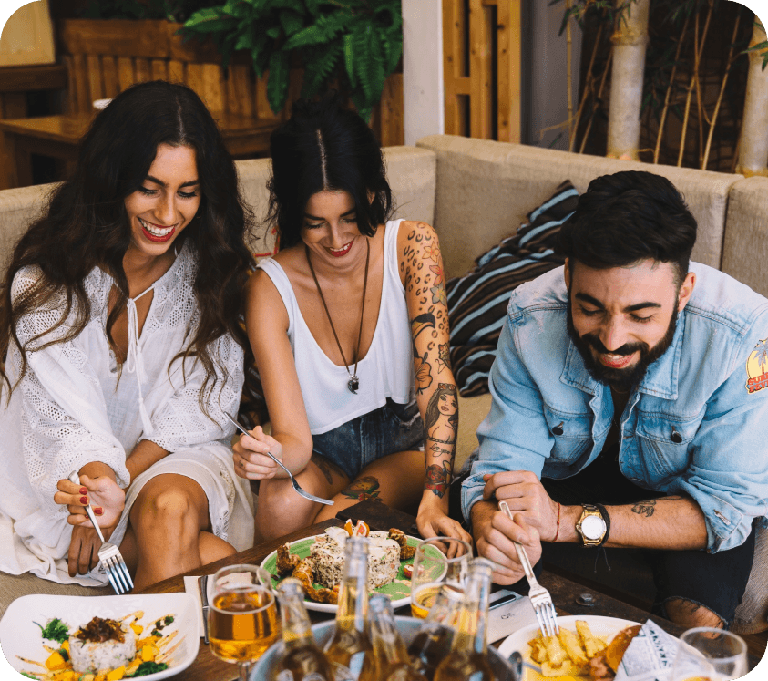 Friends enjoying food and music